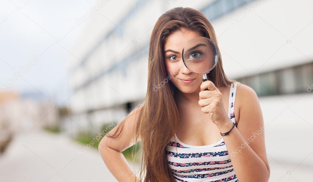 Woman with magnifying glass