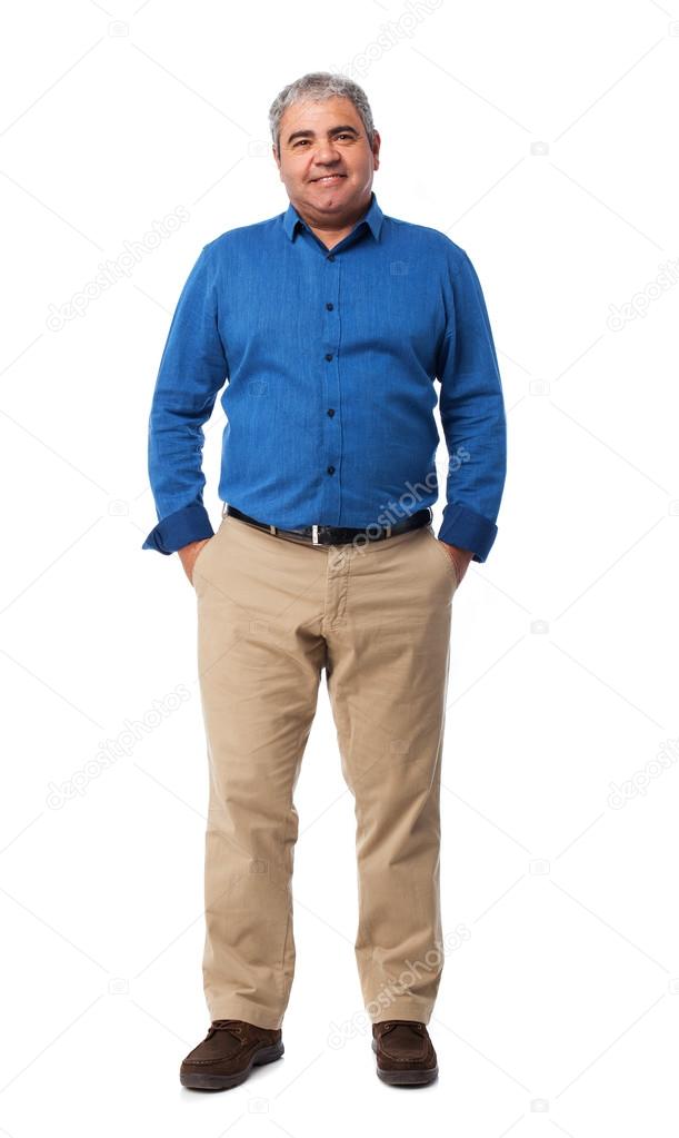 Man standing over white