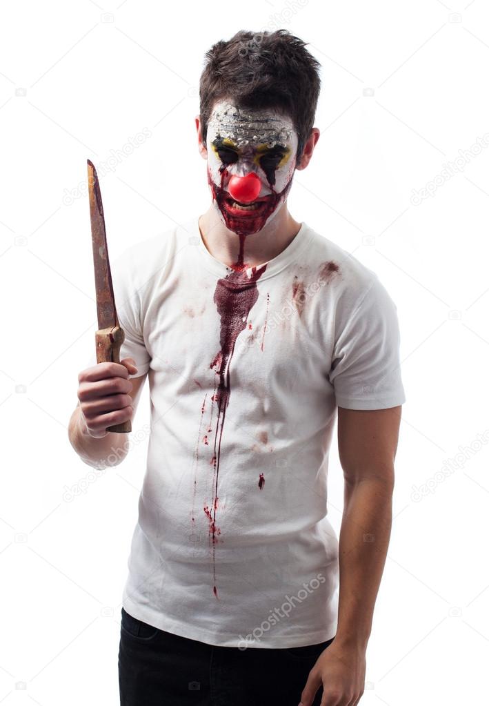 Evil clown holding a knife