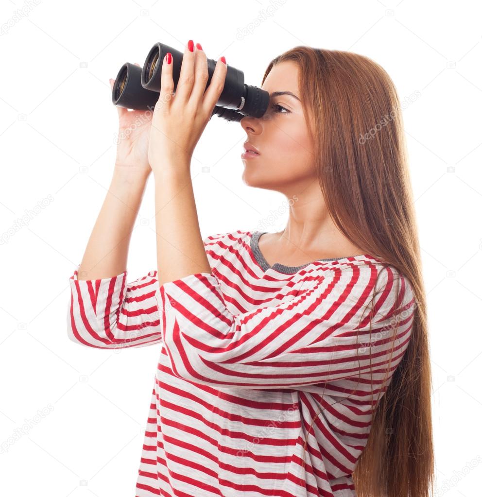 Woman looking through the binoculars