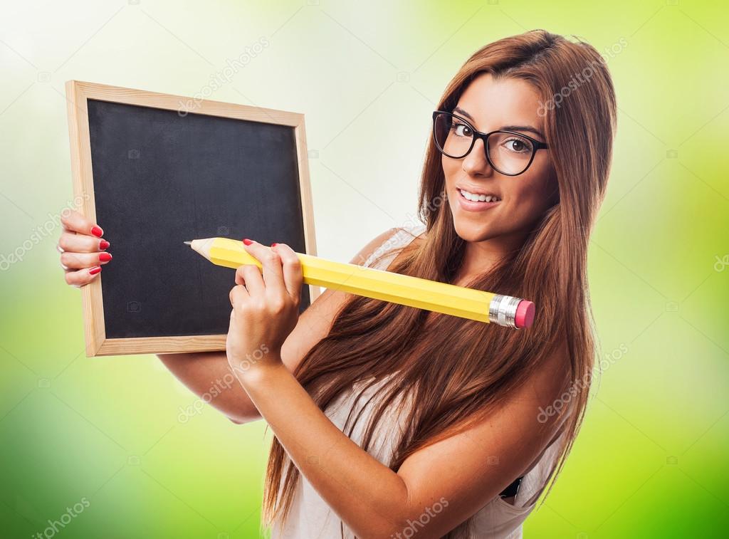 Student with big pencil and chalckboard