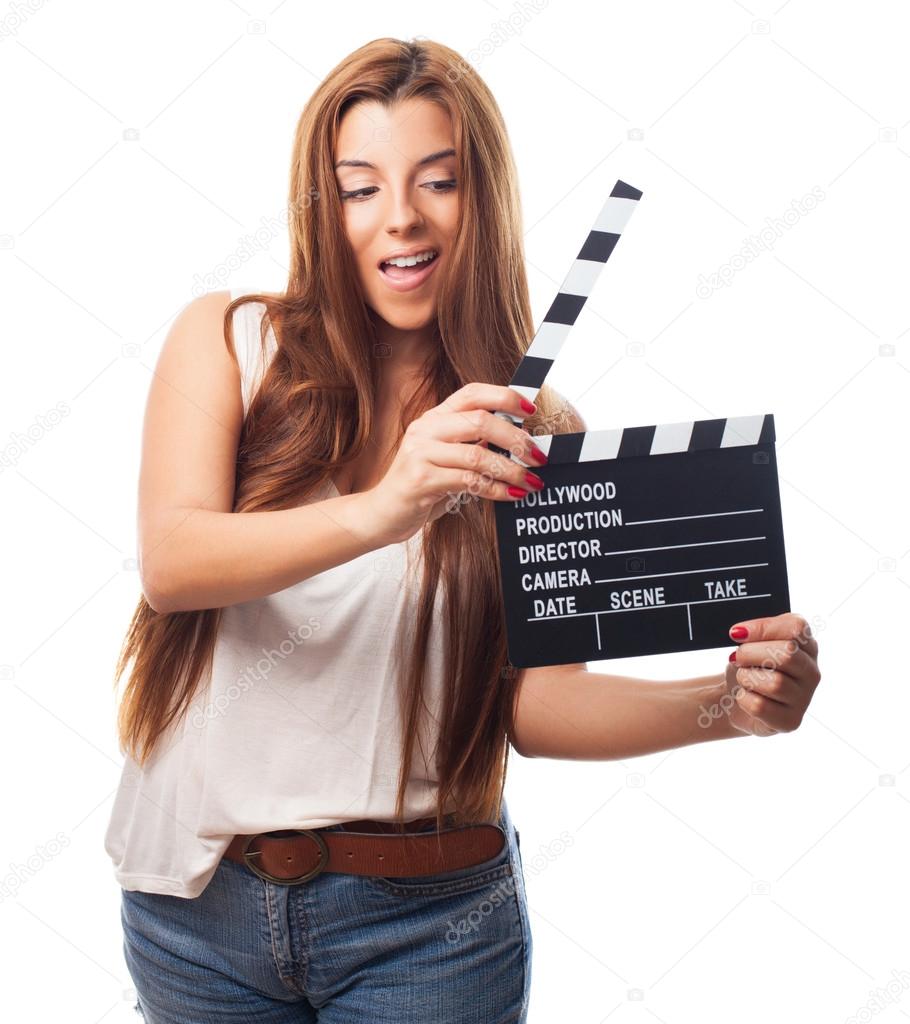 Woman holding a clapboard