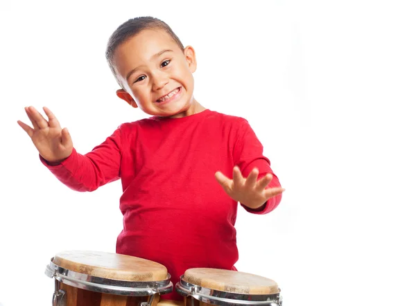 Boy playing on bongos — Stock Photo, Image