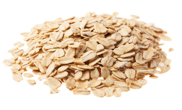 Heap of oats on white — Stock Photo, Image