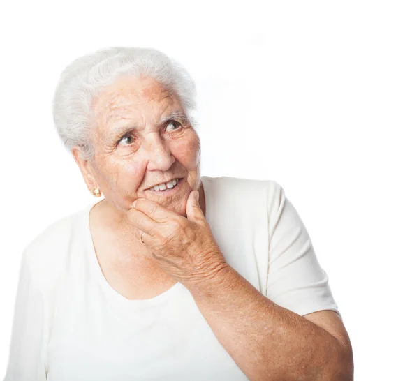 Yaşlı kadın düşünme — Stok fotoğraf