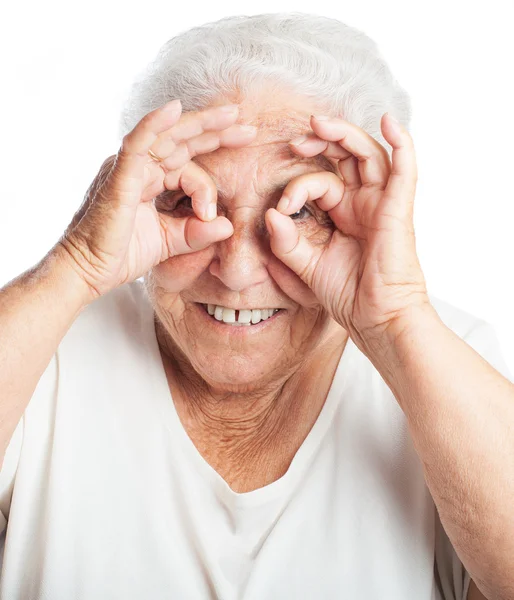 Mulher fazendo um gesto de óculos — Fotografia de Stock