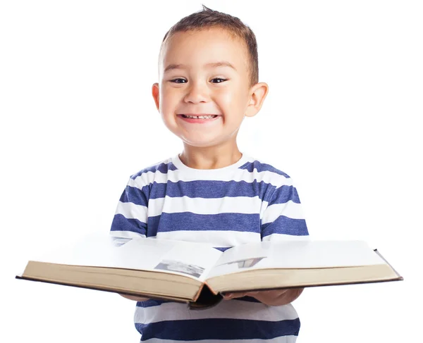 Kid holding book — Stock Photo, Image