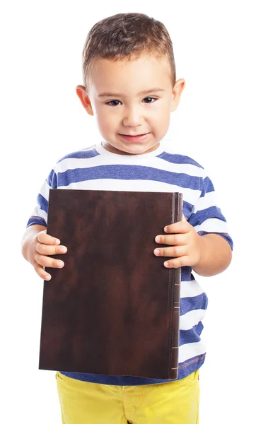 Kid holding book — Stock Photo, Image