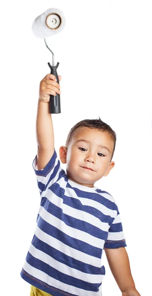 Niño con rodillo blanco — Foto de Stock