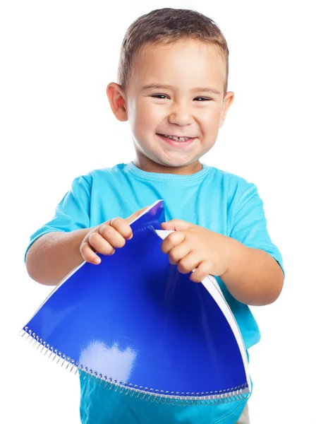 Pojke med blå anteckningsboken — Stockfoto