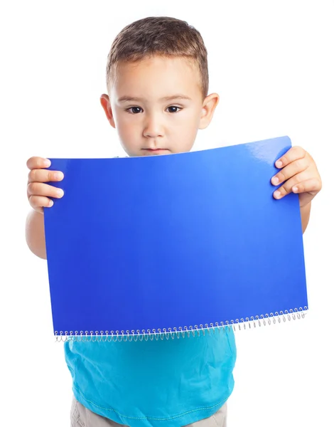 Boy with blue notebook — Stock Photo, Image