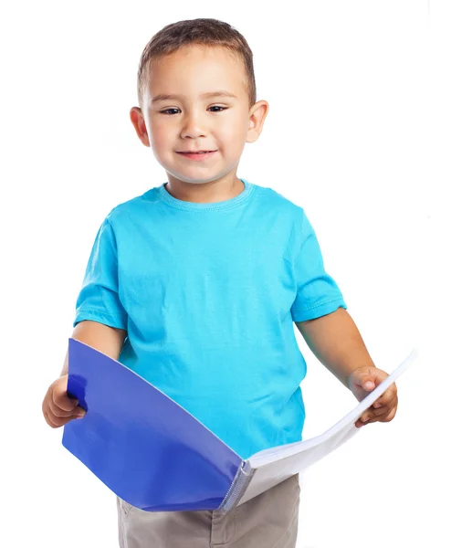 Boy with blue notebook — Stock Photo, Image