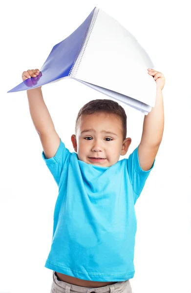 Menino com caderno azul — Fotografia de Stock