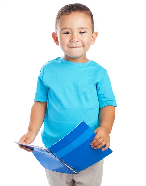 Niño con cuaderno azul — Foto de Stock