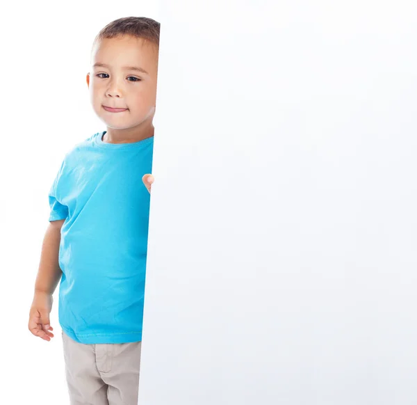 Niño detrás de la bandera — Foto de Stock