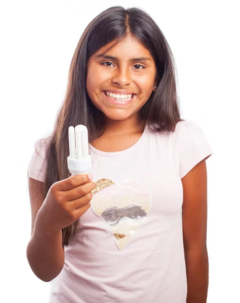 Girl holding lightbulb — Stock Photo, Image