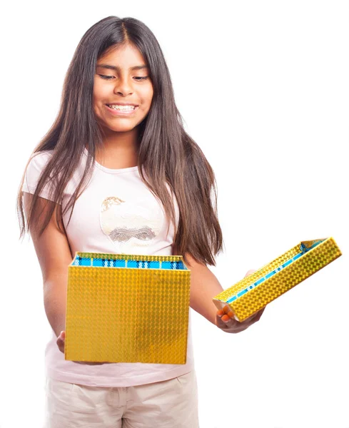 Surprised girl with present — Stock Photo, Image