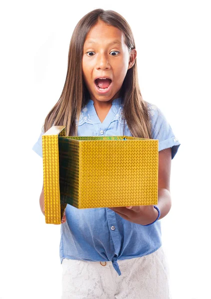 Surprised girl with present — Stok fotoğraf