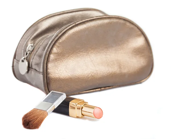 Lipstick, brush and a bag — Stock Photo, Image