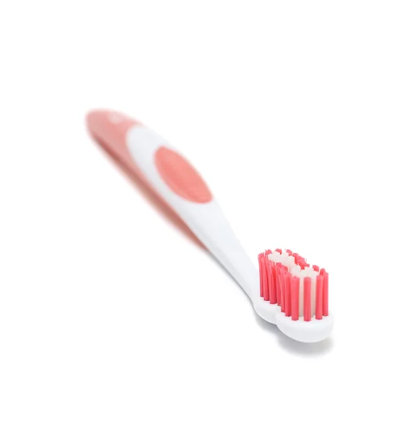 Cepillo de dientes rosa aislado — Foto de Stock