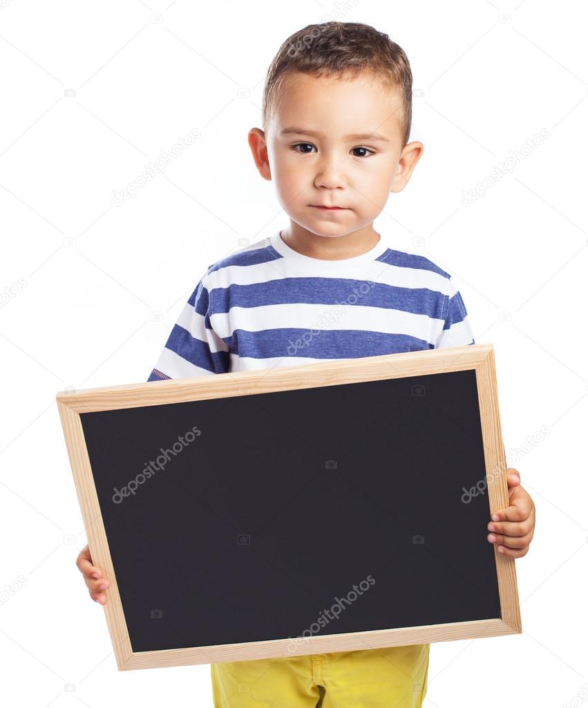 Cute kid holding chalkboard