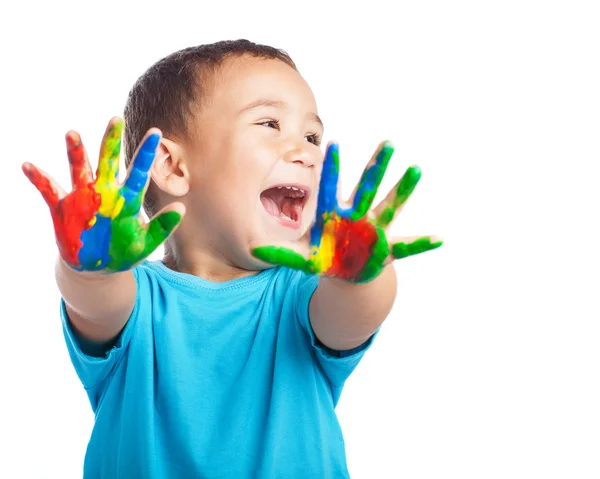 Criança com as mãos pintadas — Fotografia de Stock