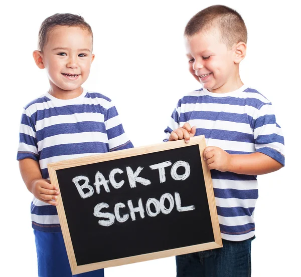 Children  holding a blackboard — Stock Photo, Image