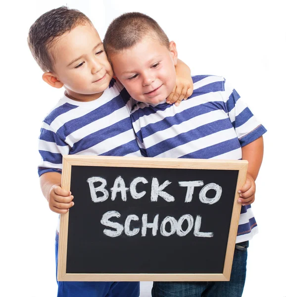 Children  holding a blackboard — Stock Photo, Image