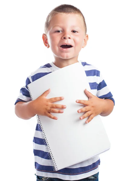 Dziecko trzyma pewien notatnik — Zdjęcie stockowe