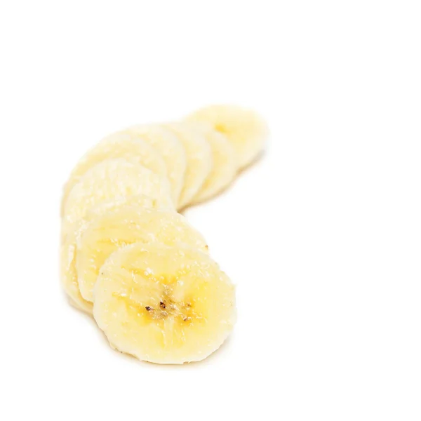 Banán szeletek, fehér — Stock Fotó