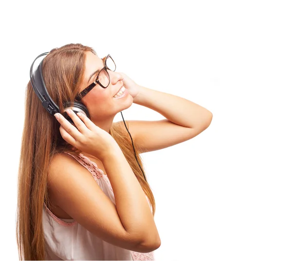 Woman listening to music — Stock Photo, Image