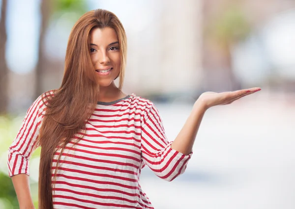 Woman holding something — Stock Photo, Image