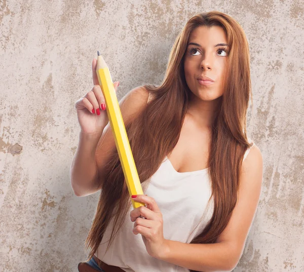 Woman holding a pencil — Stock Photo, Image