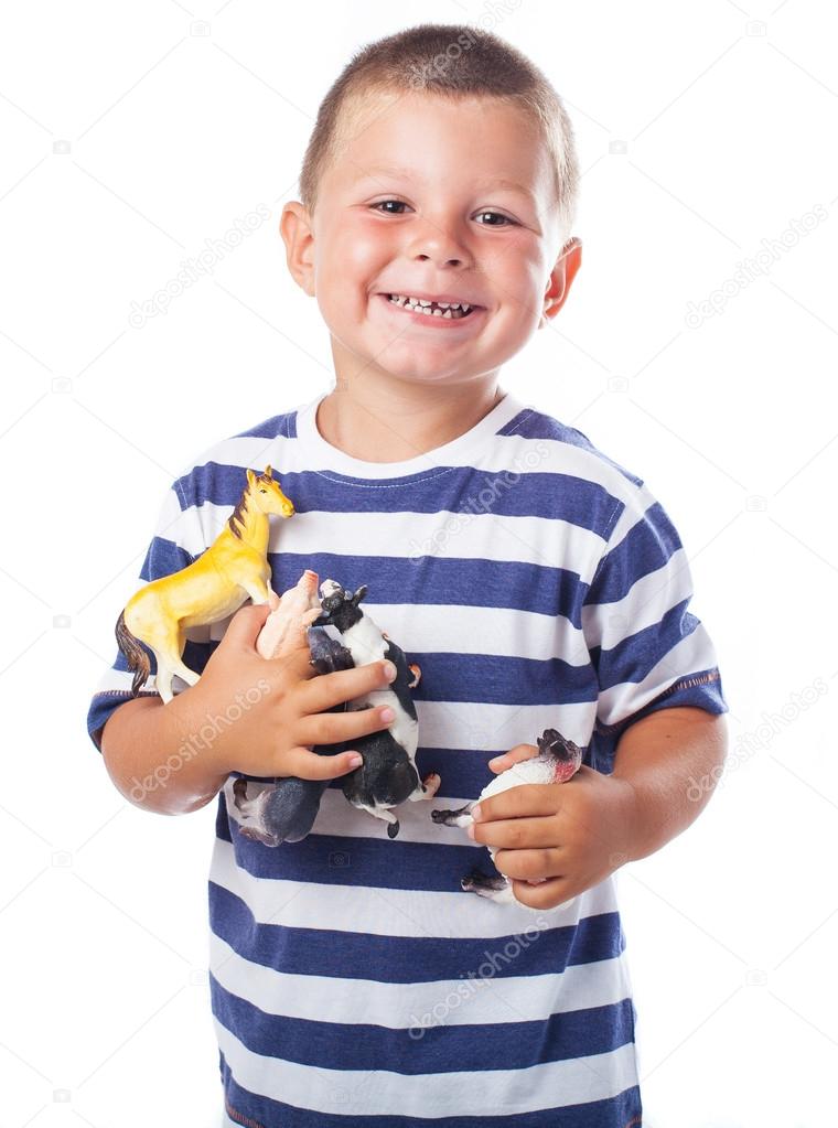 Child holding toys