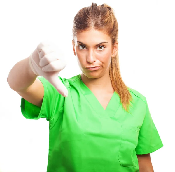 Sjuksköterskan gör negativ symbol — Stockfoto