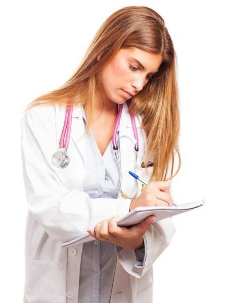 A doctor making notes on a notepad — Stock Photo, Image