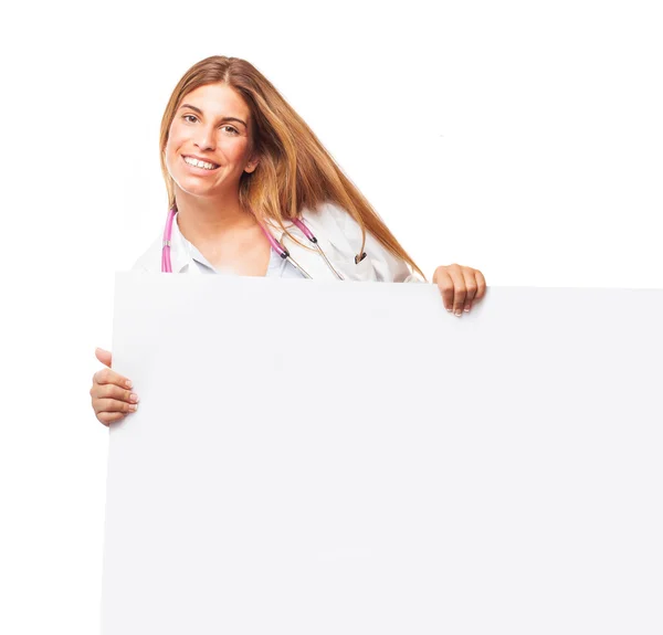 Doktor drží bílá transparent — Stock fotografie