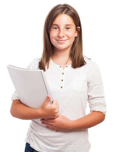 Menina segurando um caderno — Fotografia de Stock