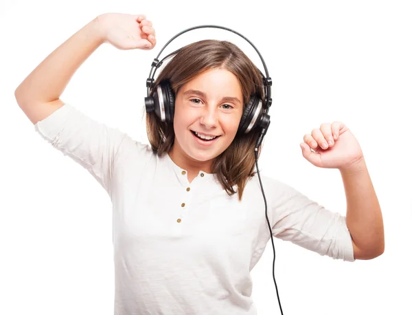 Girl using headphones — Stock Photo, Image