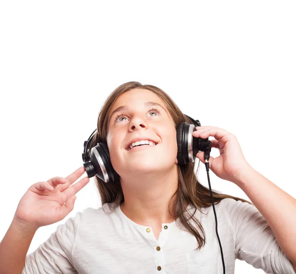 Girl using headphones — Stock Photo, Image