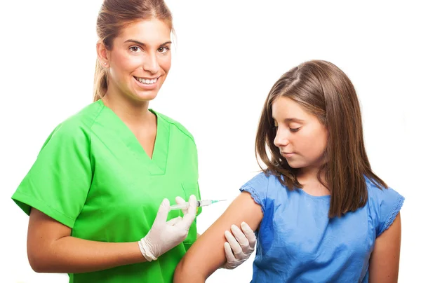 Nurse injecting to a girl Stock Photo