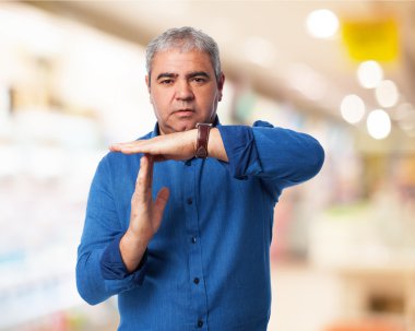 Man shows time out gesture clipart