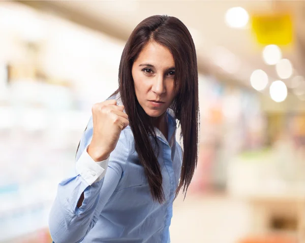 Woman showing power gesture — Stock Photo, Image