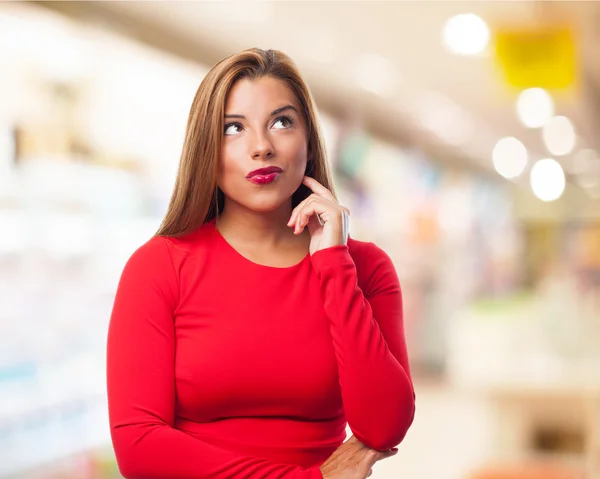 Young woman thinking about idea — Stock Photo, Image