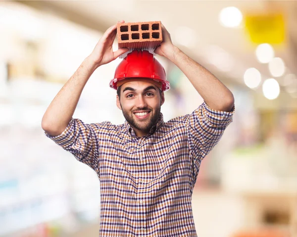 Arbeiter Mann mit Ziegel — Stockfoto