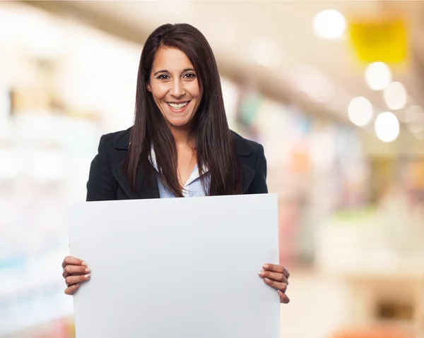 Cool businesswoman with banner — Stock Photo, Image