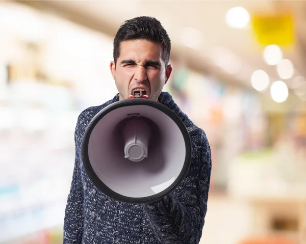 Man som använder megafon — Stockfoto