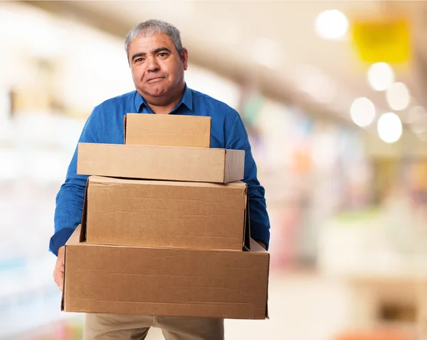 Man anläggningen lådor — Stockfoto