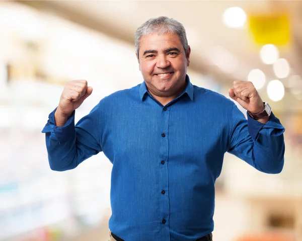 Man shows victory gesture — Stock Photo, Image