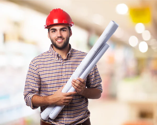 Architect man with planes — Stock Photo, Image